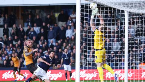 Oli McBurnie has an effort saved by Millwall goalkeeper Anthony Patterson