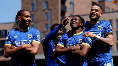 AFC Wimbledon celebrate Josh Neufville's goal