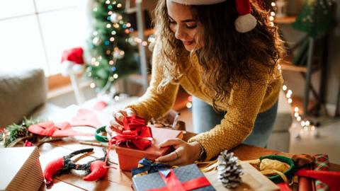 Woman packing presents for friends and family