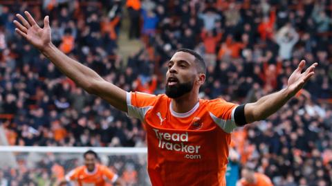 Blackpool's CJ Hamilton celebrates his winner against Burton