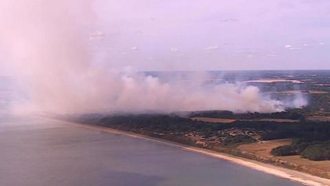 Aerial shot of coastal fire