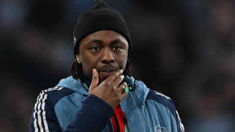 Arsenal's Eberechi Eze puts his hand to his chin after the League Cup final defeat by Manchester City