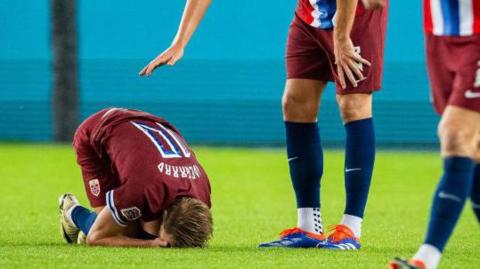 Martin Odegaard after being injured playing for Norway against Austria