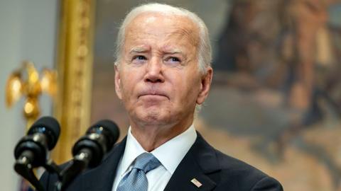 Joe Biden looks on during a speech at the White House on 14 July 