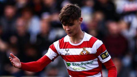 Charlie Crew playing for Doncaster Rovers during his loan spell last season 
