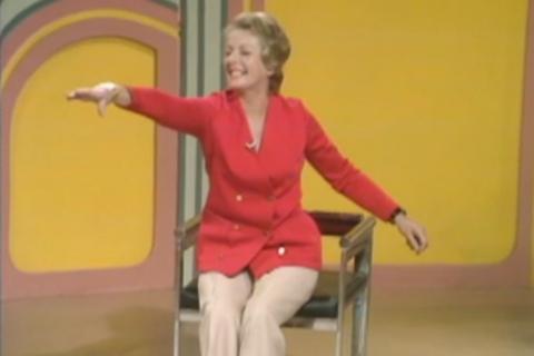 Eileen Fowler doing chair exercises