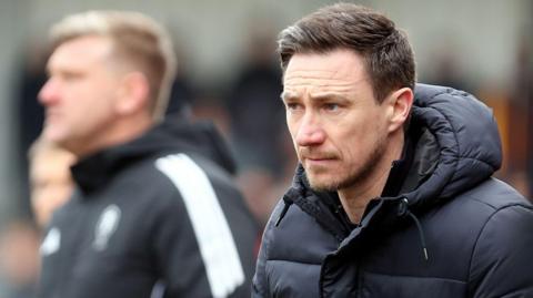 Stuart Maynard watches his Notts County side from the touchline