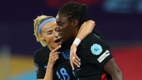 chloe kelly hugs michelle agyemang and celebrates with her following agyemang's goal