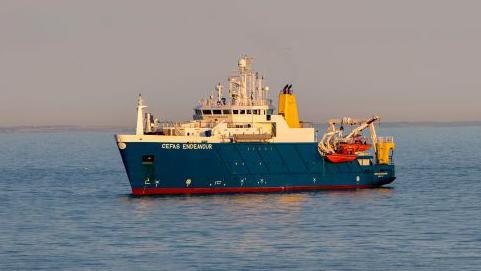 The Cefas Endeavour research vessel sails on the sea. 