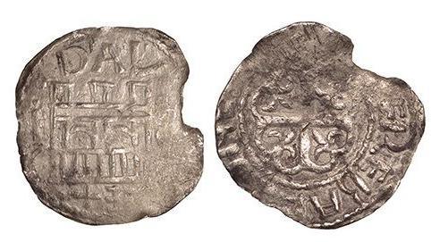 Two sides of a medieval grey coloured coin. One side depicts a crudely drawn castle, and the other a cross.