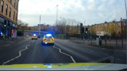 View from a police car dash cam of a police pursuit in Glasgow