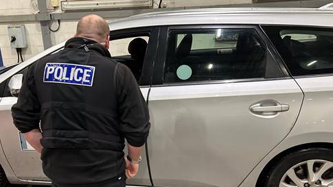 An officer speaks with a driver in York city centre