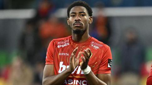 Oostende's Zech Medley and Oostende's Fraser Hornby after losing a soccer match between KV Oostende and OH Leuven, Saturday 15 April 2023 in Oostende, on day 33 of the 2022-2023 'Jupiler Pro League' first division of the Belgian championships.