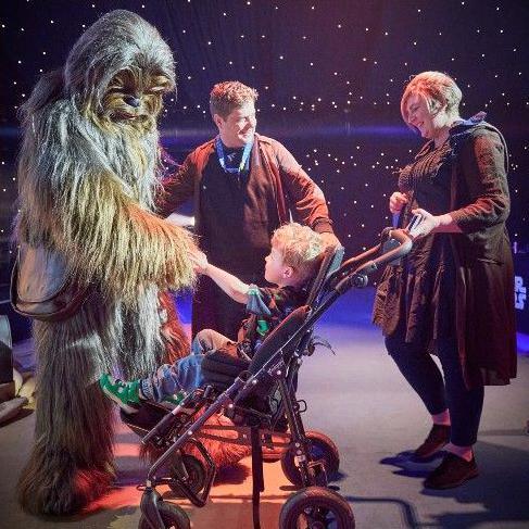 Seth in his pram, meeting Chewbacca