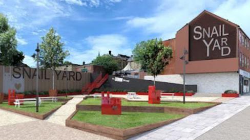 Artist's impression of the Snail Yard site, with benches, trees and grass together with a fence bearing the name "Snail Yard". A building next to the site also carries the name "Snail Yard"