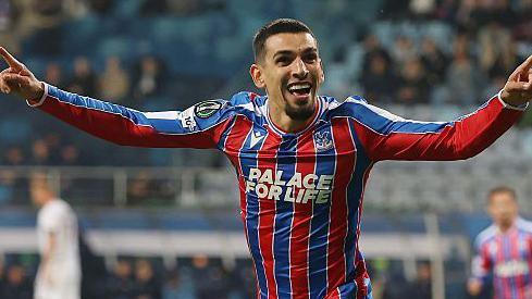 Daniel Munoz celebrates after scoring