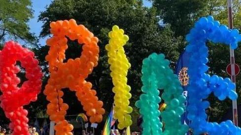 Coloured balloons spelling out Pride at Pride in Surrey event.
