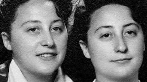 Jona Laks poses in a black and white photo with her sister after the war