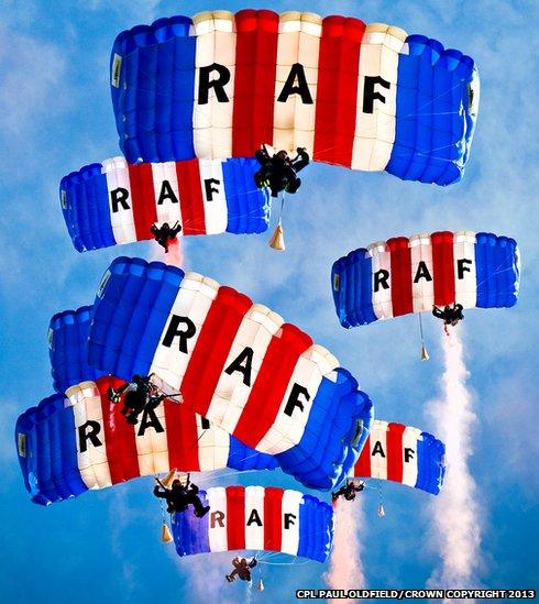 Royal Air Force Falcons freefall display team pictured from the landing zone