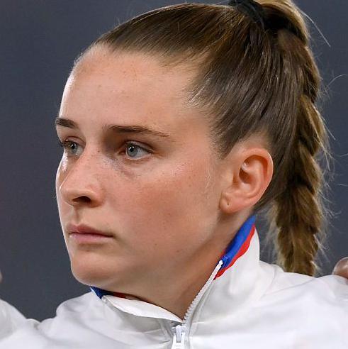 Ella Toone lining up before an England game