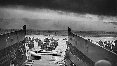 Soldiers disembarking a ship at the D-Day landings