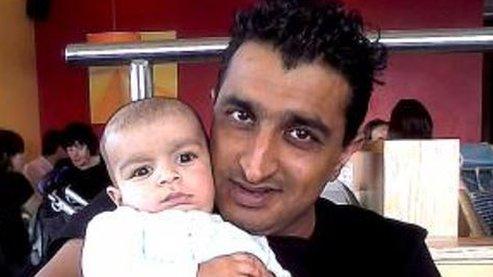 Sajiid Saddique with a child