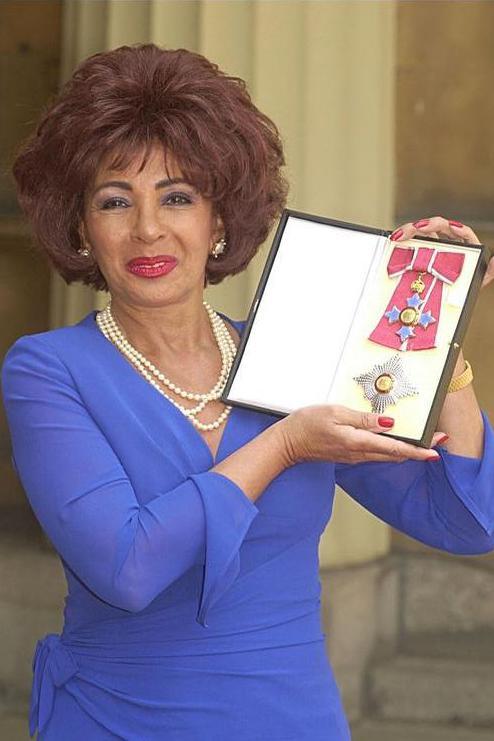 Shirley Bassey posing with her honour