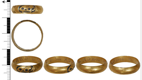 A photo which shows the ring from different angles. It shows the ring, which is gold, and a skull engraved onto it. Inside the ring is more engraving of a date and initial