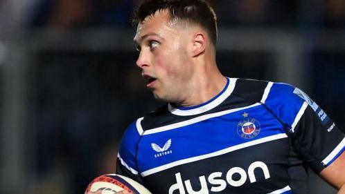 Bath scrum-half Tom Carr-Smith runs in his team's second try against Harlequins