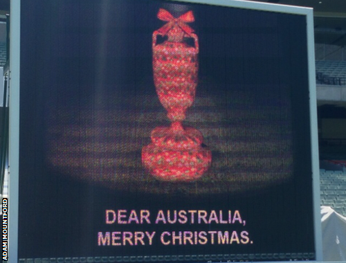 A digital advertising board wishes Australia Merry Christmas after their cricket side had wrapped the 2013-14 Ashes pre-Boxing Day Test