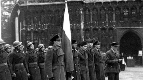 Members of the 307 Squadron present a flag to Exeter on 15 November 1942 during a ceremony outside Exeter Cathedral.