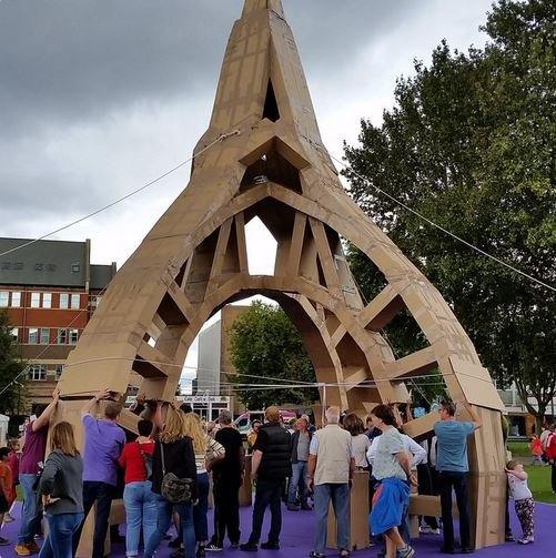 Festival visitors built a 15-metre-tall 'People's Tower' on Sunday