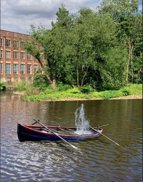 Artist's impression of BIDE: a traditional Yorkshire coble - or rowing boat - flooding with water at Kelham Island weir