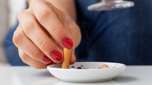 Woman stubbing out cigarette