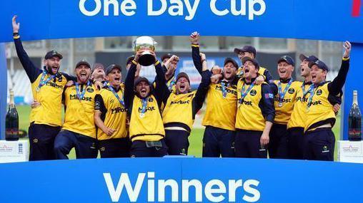 Glamorgan players celebrate lifting the Metro Bank One Day Cup