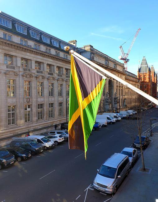 Image of the Jamaican flag outside the Jamaican High Commission