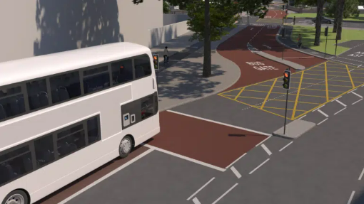 An artist’s impression of a new bus-only road on Bedminster Parade with a white double decker bus waiting at a traffic light and a bus gate off to the left, marked with a red surface