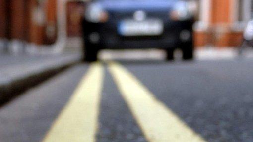 Car parked on double yellow line