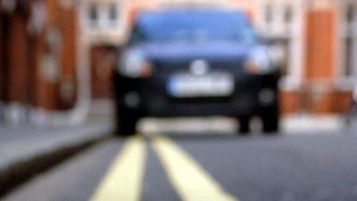 car parked on double yellow lines