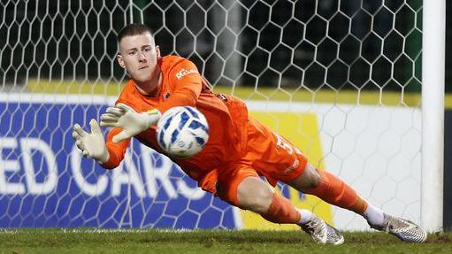 David Walsh makes a save for Linfield against Glentoran