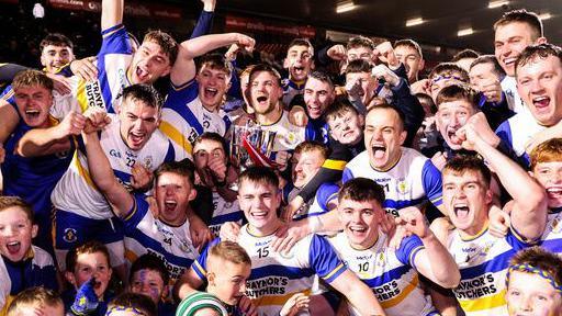 Errigal Ciaran players celebrate after their narrow Tyrone county final win over Trillick in Healy Park, Omagh