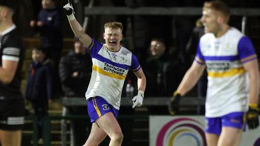 Errigal defender Peter Og McCartan celebrates the winning point deep in stoppage time to earn the Tyrone champions a third Ulster club SFC title