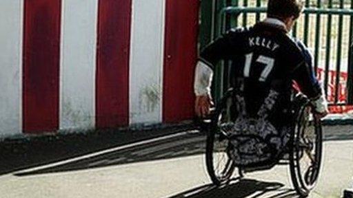 A disabled football fan