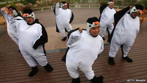 people dressed as penguins