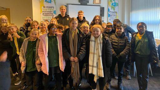 Hull City apprentices Ed Devine and Archie Howard with Priory Primary School pupils