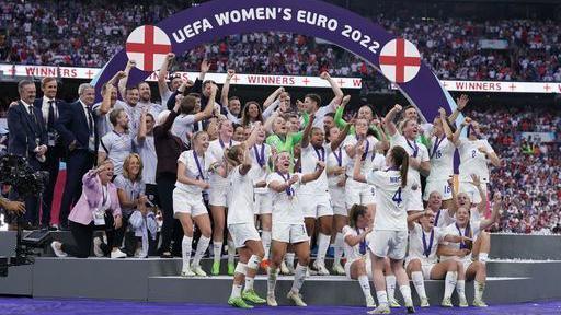 England players celebrate with the trophy following victory over Germany in the UEFA Women's Euro 2022 final at Wembley Stadium