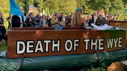 Campaigners gather at the river in Ross-on-Wye