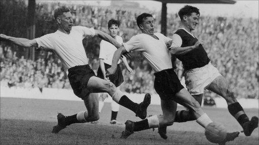 Jimmy McIlroy (far right) in action during his heyday