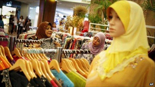 Malaysian Muslims shop for clothes at a mall