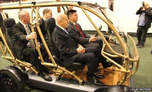 Israeli President Shimon Peres on board Local Motion's vehicle